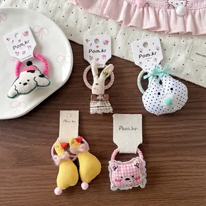 Chouchous mignons style coréen en tissu peluche avec divers motifs d'animaux de dessin animé