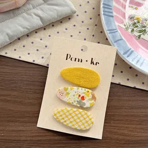 Set van drie haarspeldjes met bloemen en ruitjesstof voor kleine meisjes