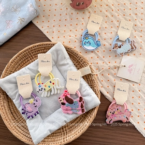 Cute embroidered cartoon animal hair ties set with whale and cat designs on card