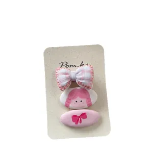 Lot de trois barrettes à cheveux en tissu rose à carreaux avec nœud et motif fille