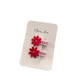 Set of two red fabric flower hair clips for children with red and white gingham ribbons