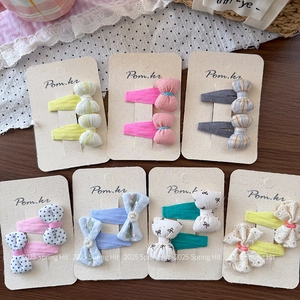 Set of Korean style polka dot and floral bow hair clips for girls on display cards