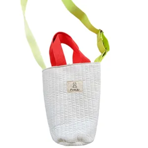 Cute white quilted bucket bag with red handle and green strap for women and girls