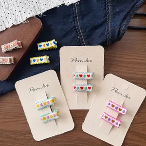 Fermagli per capelli ricamati a cuore con pizzo per bambine in colori assortiti