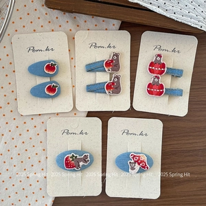 Lot de cinq barrettes ours brodées en denim pour filles présentées sur une carte support