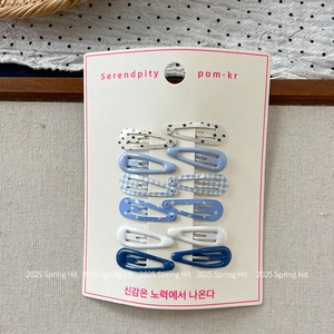 Detailed set of 12 blue and white teardrop BB hair clips with floral and star patterns