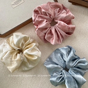 Set of 3 elegant silk satin scrunchies in pink, champagne, and blue for high ponytails