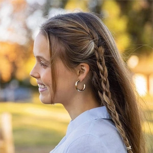 Polished thick golden hoop earrings for women in stainless steel, elegant style