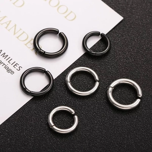 Polished silver and black clip-on hoop earrings in various sizes with movable hinges