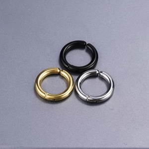 Three-piece clip-on hoop earrings set in black, gold, and silver polished finishes