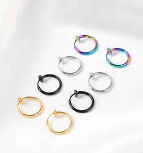 Close-up of spring-clip non-piercing earrings in gold silver black and rainbow colors