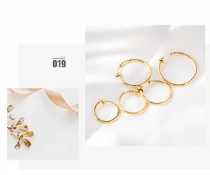 Set of five polished gold spring clip-on earrings for men in various sizes with a glossy finish