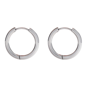 Detailed close-up of a pair of polished silver titanium steel hoop earrings with snap closure