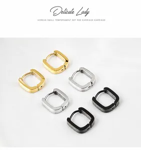 Three pairs of square U-shaped earrings in gold, silver, and black with textured finish