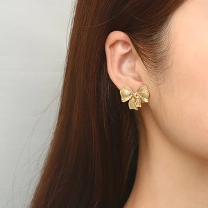 Élégantes boucles d'oreilles nœud papillon en acier inoxydable plaqué or 18 carats