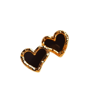 Vintage heart earrings in black and gold alloy with elegant textured molten edges