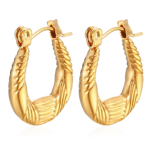 Detail of 18K gold-plated stainless steel hoop earrings with unique twisted textures