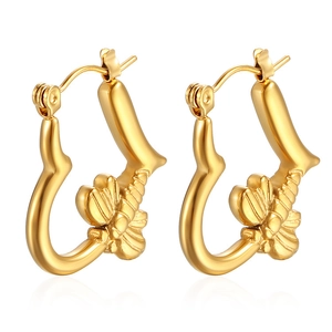Detail of 18K gold heart-shaped stainless steel earrings with butterfly embossing
