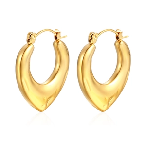 Macro shot of polished 18K gold-plated stainless steel heart-shaped chunky hoop earrings