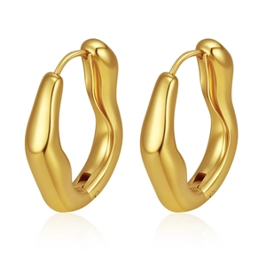 Elegant gold wavy hoop earrings with vintage irregular aesthetic and smooth metallic finish