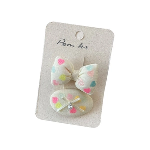 Sweet bow and oval hair clip set with colorful heart patterns and pearl detail