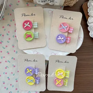Sweet button bow hair clips set with colorful plaid fabric wrapping in vibrant dopamine colors