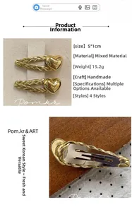 Detailed view showing the size and metallic texture of these heart shape hair clips