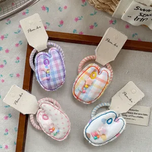 Lot de quatre chouchous en tissu à carreaux avec perles en forme d'étoile colorées