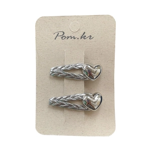 Silver woven heart hair clip set on display card with a minimalist trendy aesthetic