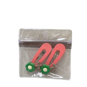 Korallorangene ovale Haarspangen mit grünen Blumenakzenten für Damen, 2er-Set