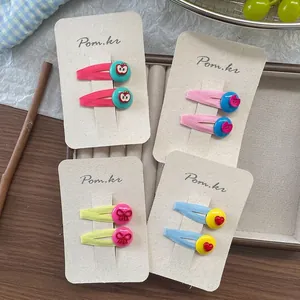 Colorful fabric hair clip set with apple and heart button designs for girls