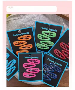 Polka dot wavy hair clips in six candy colors displayed on professional fashion cards