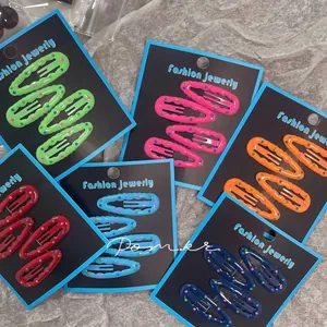 Polka dot candy-colored snap hair clips in vibrant shades for girls' styling