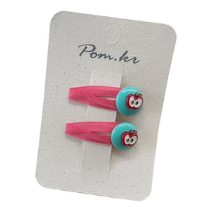 Set of two colorful apple pattern hair clips with pink ribbon and blue accents