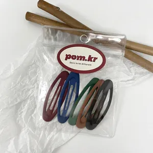 Five-piece set of matte Morandi color snap hair clips in transparent retail packaging