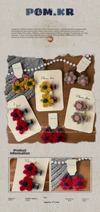 Détail de la pince à cheveux fleur faite main au crochet avec texture douce en coton