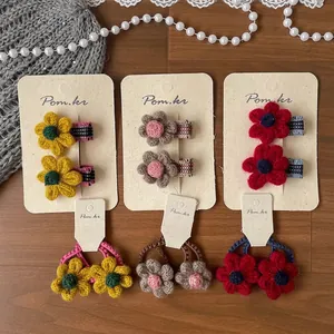 Ensemble de barrettes à fleurs au crochet pour enfants aux tons jaune et rouge