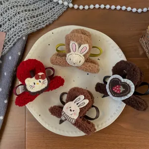 Set of four cute plush bear hair claws for kids with cartoon embroidery in various colors