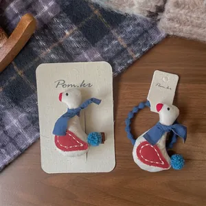 Niedliches Haarklammer-Set mit Gänse-Motiv und blauem Pompon für Kinder
