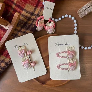 Roze geruite konijnenoren haarspeldjes set met strikjes en bijpassende haarelastiekjes