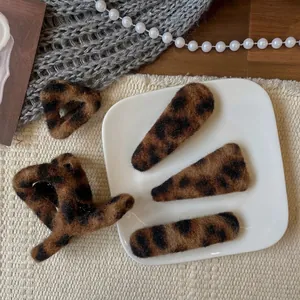 Plush leopard print hair clip set including claw and side clips for autumn and winter