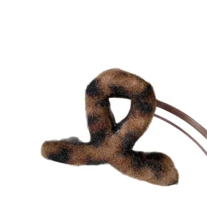 Autumn leopard print plush hair clip with soft faux fur texture for girls and women