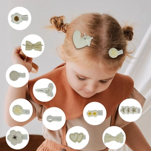 Fermagli per capelli in tessuto crema per bambine con perle e dettagli floreali