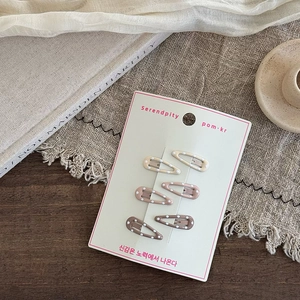Set of 6 polka dot hair clips in beige and pink displayed on an aesthetic ins-style card