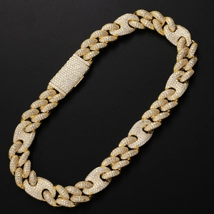Close-up of iced out 20mm Cuban link chain with gold finish and full zircon stones
