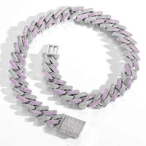 Macro view of 20mm Miami Cuban link necklace with white and pink zircon paving