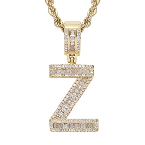 Macro view of hip hop capital letter Z pendant with gold plating and square-cut zircons
