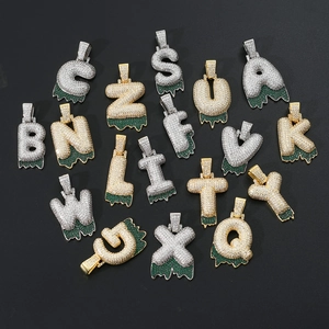 Hip-hop iced out bubble letter pendants with green lava melt effect in gold and silver