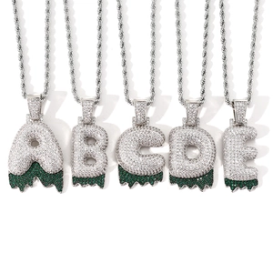 Hip hop silver pendant with white zircons and green lava drip effect on rope chain