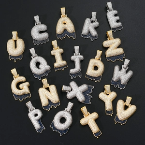 Hip hop bubble letter pendant set with gold and silver plating and blue lava crystals